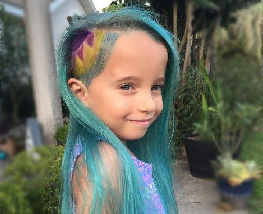 Lyra Thomaston, 6, from Florida modelling her new "unicorn" hair.