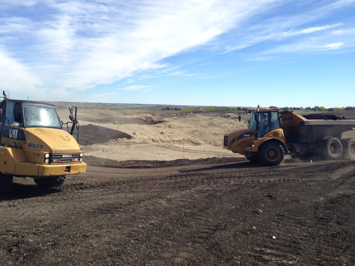 Construction crews building Mickelson National Golf Club. Springbank, Alberta. Sept 2016.