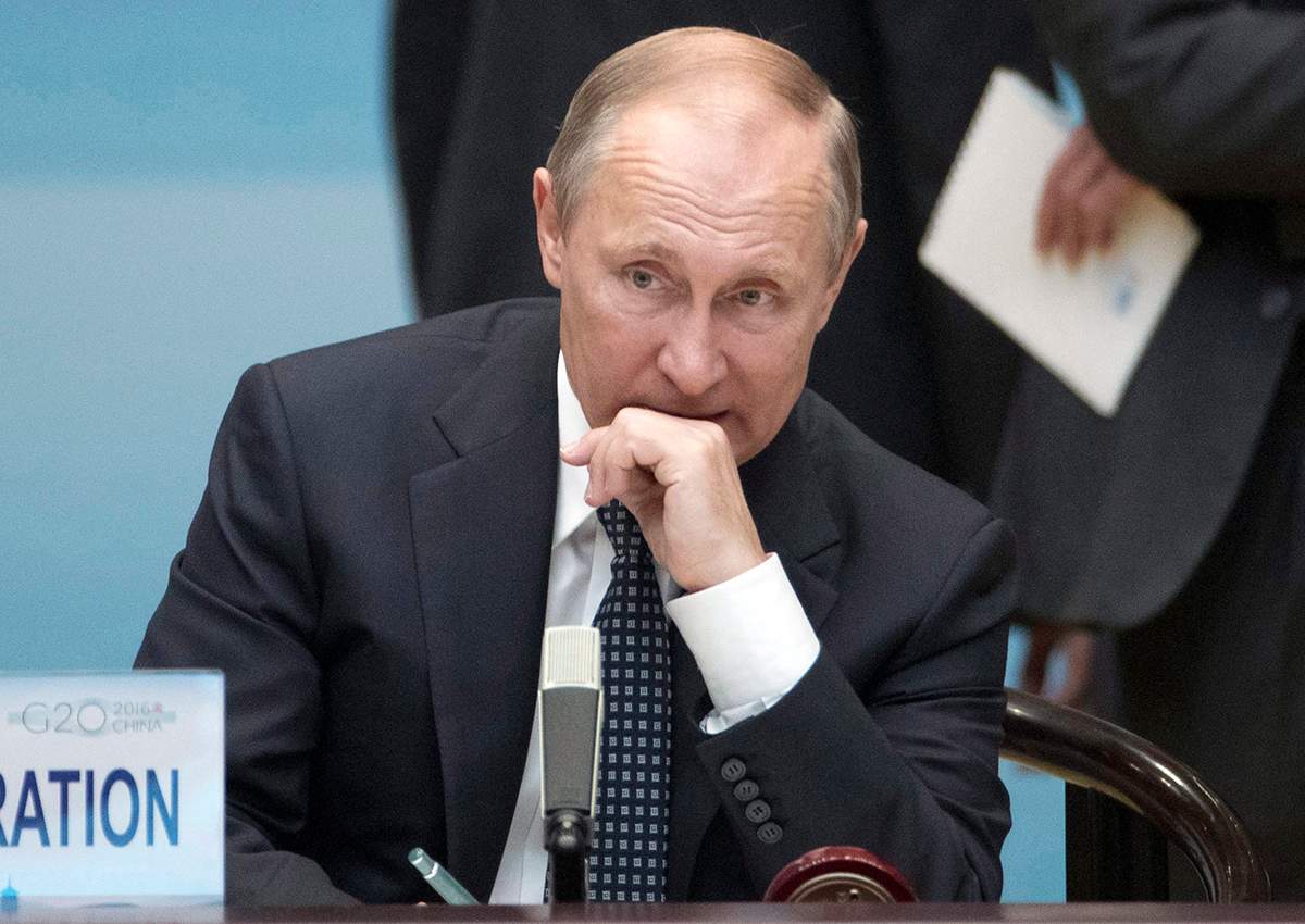 Russian President Vladimir Putin sits before the start of the opening ceremony of the G-20 Summit in Hangzhou in eastern China's Zhejiang province, Sunday, Sept. 4, 2016. 