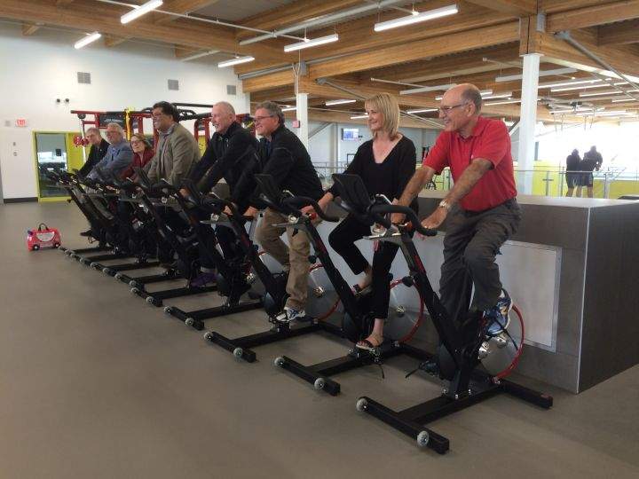Officials, including Mayor Naheed Nenshi, mark the grand opening of the Remington YMCA in Quarry Park on Saturday, Sept. 10, 2016.