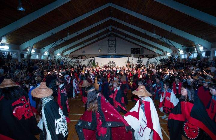 Children perform a dance during a welcoming ceremony for the Duke and Duchess of Cambridge at the Heiltsuk First Nation in the remote community of Bella Bella, B.C., on Monday, September 26, 2016.
