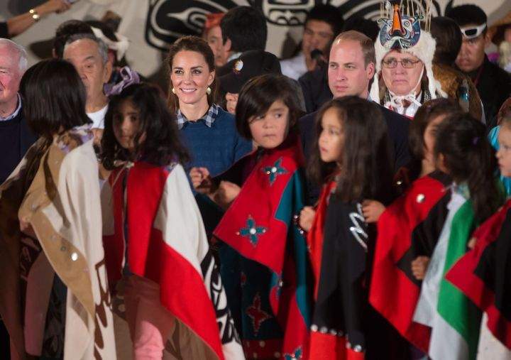 Young First Nations children walk past Britain’s Prince William, the Duke of Cambridge, and Kate, the Duchess of Cambridge, during a welcoming ceremony at the Heiltsuk First Nation in the remote community of Bella Bella, B.C., on Monday September 26, 2016.