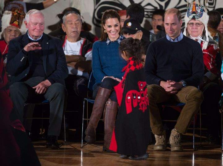 A young First Nations girl walks past Prince William, Kate and Governor-General David Johnson, left, during a welcoming ceremony at the Heiltsuk First Nation in the remote community of Bella Bella, B.C., on Monday September 26, 2016.