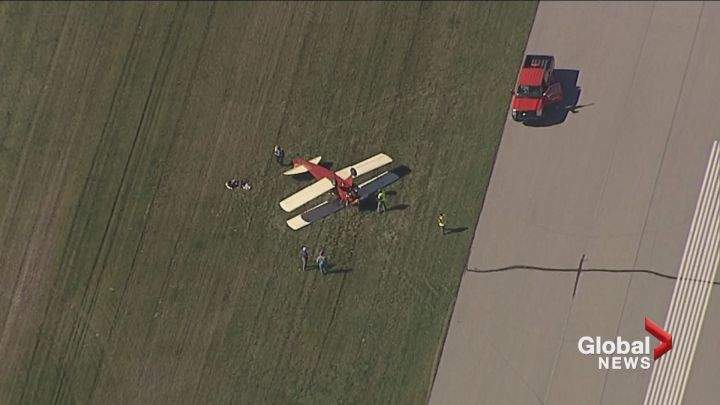A plane flipped over after landing at the Springbank Airport Sept. 13, 2016.