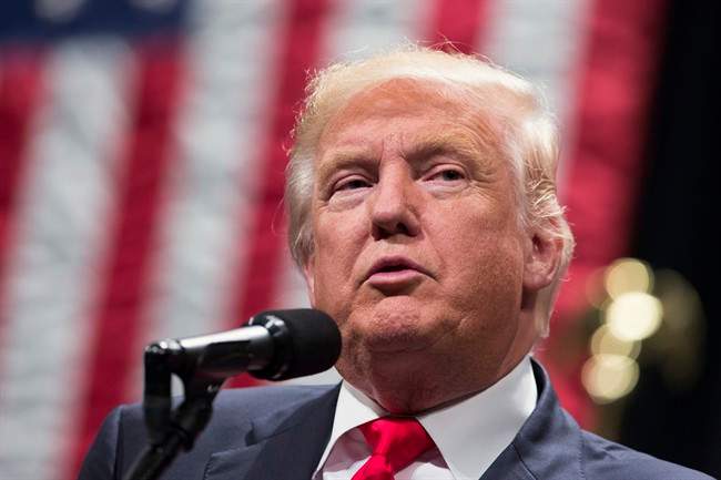  In this Sept. 21, 2016 file photo, Republican presidential candidate Donald Trump speaks during a campaign rally in Toledo, Ohio. In the final sprint to Election Day, Donald Trump faces a daunting series of roadblocks in the minds of Americans as he tries to catch up to Hillary Clinton. 