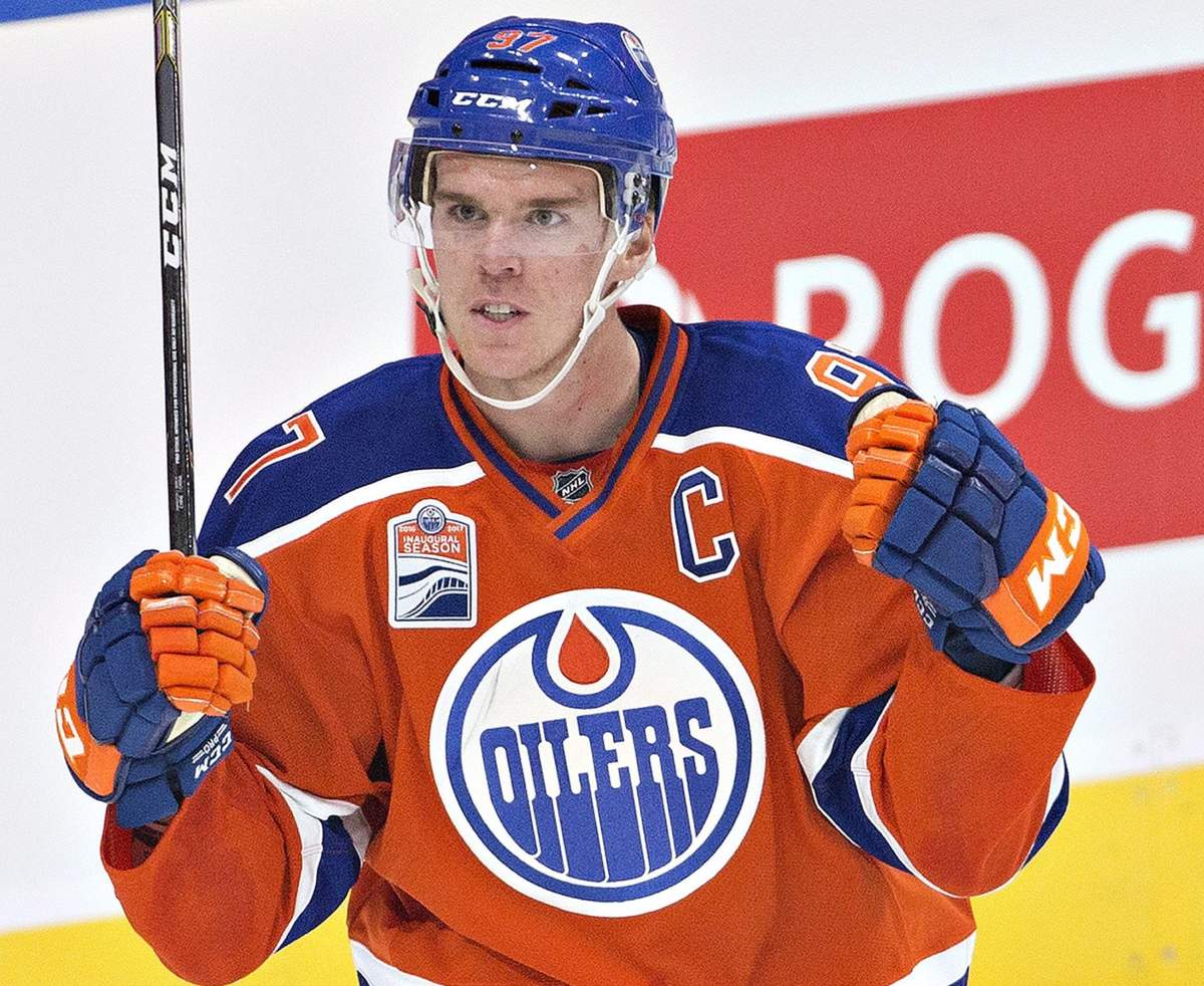 Edmonton Oilers' Connor McDavid (97) celebrates a goal against the Calgary Flames during second period NHL action in Edmonton, Alta., on Wednesday October 12, 2016. 