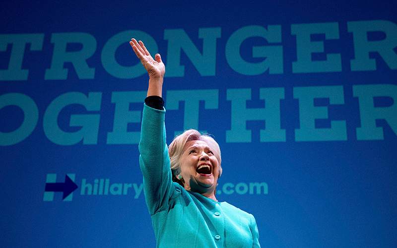 Democratic presidential candidate Hillary Clinton waves as she takes the stage to speak at a fundraiser at the Paramount Theatre in Seattle, Friday, Oct. 14, 2016. 