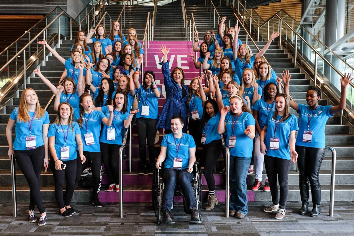 Premier Christy Clark poses with some high school students in attendance at this year's We for She Conference in Vancouver.