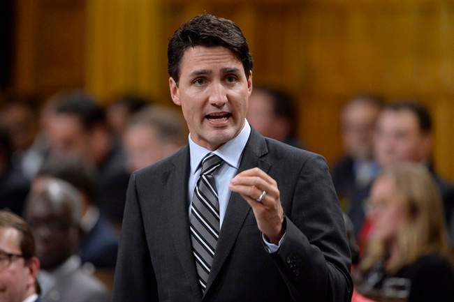 Prime Minister Justin Trudeau answers a question during Question Period in the House of Commons in Ottawa on Monday, Oct.3, 2016. 