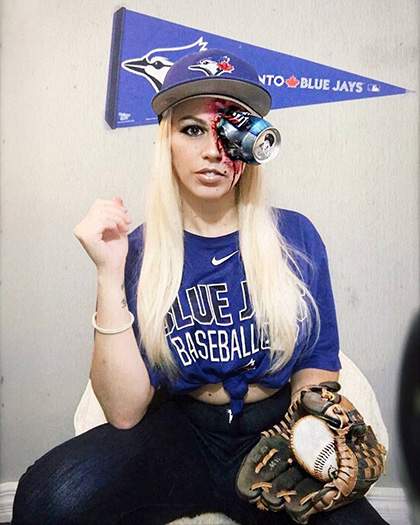 For Halloween this year, makeup artist Stephanie Marziano-Hillhouse took the beer throwing incident from the AL wild-card game and used makeup to show a can sticking out of her eye.