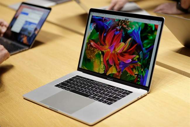 MacBook computers are shown in a demo room following the announcement of new products at Apple headquarters Thursday, Oct. 27, 2016, in Cupertino, Calif.