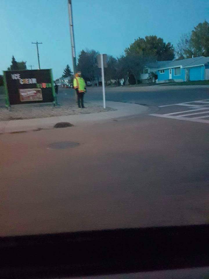 Jordan White standing in ‘creepy clown’ costume in Taber Alberta.