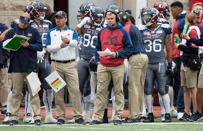 Montreal Alouettes head coach Jacques Chapdelaine, centre, looks on from the sideline during first half CFL football action in Montreal in an October 2, 2016, file photo. The Als have not won twice in a row this season and are hoping the jolt of promoting Jacques Chapdelaine to head coach will last at least another week as they face the Edmonton Eskimos. 