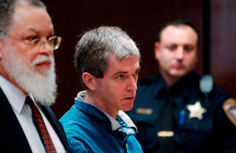 Charles Cullen, center, a former nurse who has pleaded guilty to committing 29 murders and six attempted murders over the course of his 16-year nursing career in New Jersey and Pennsylvania, is seen as he stands next to his attorney, Johnnie Mask, left, in state Superior Court in Newark, N.J., Thursday, Dec. 16, 2004.