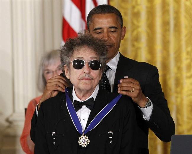 Barack Obama presents Bob Dylan with a Medal of Freedom in this May 29, 2012 file photo.