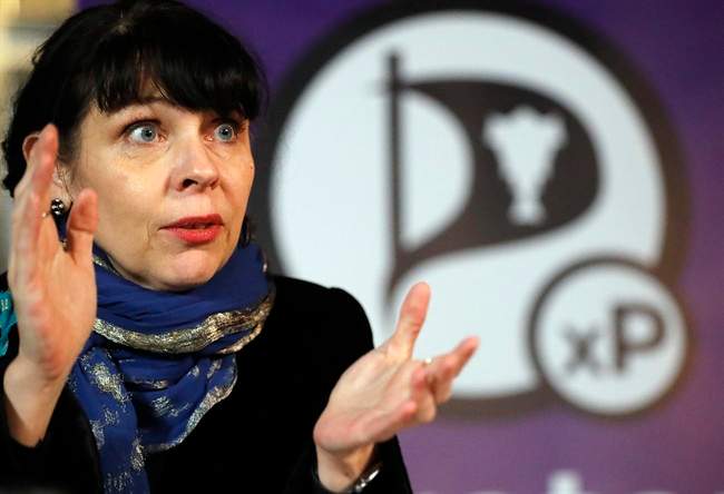 Birgitta Jonsdottir of the Pirater (Pirate) Party addresses the media during a conference in Reykjavik, Iceland, Sunday, Oct. 30, 2016.