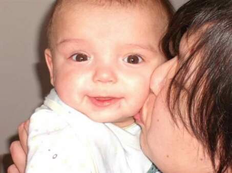 Newborn photo album of Eileen and son Jacob in 2008.
