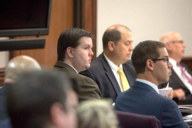 Justin Ross Harris, left, listens to opening statements during his trial at the Glynn County Courthouse in Brunswick, Ga., Monday, Oct. 3, 2016.