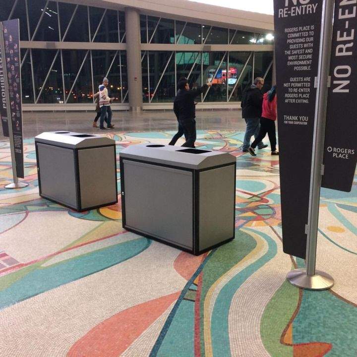 Rogers Place said it vows it will never again place garbage cans on the Iron Foot Place tile mosaic in Ford Hall after pictures of the arena doing just that caused public outcry on social media Wednesday, Oct. 12, 2016.