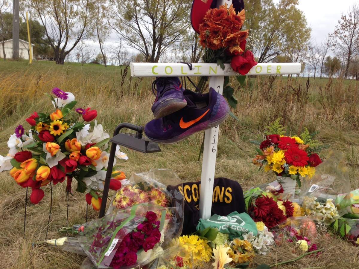 A cross memorializing Colin Roer on Highway 207.