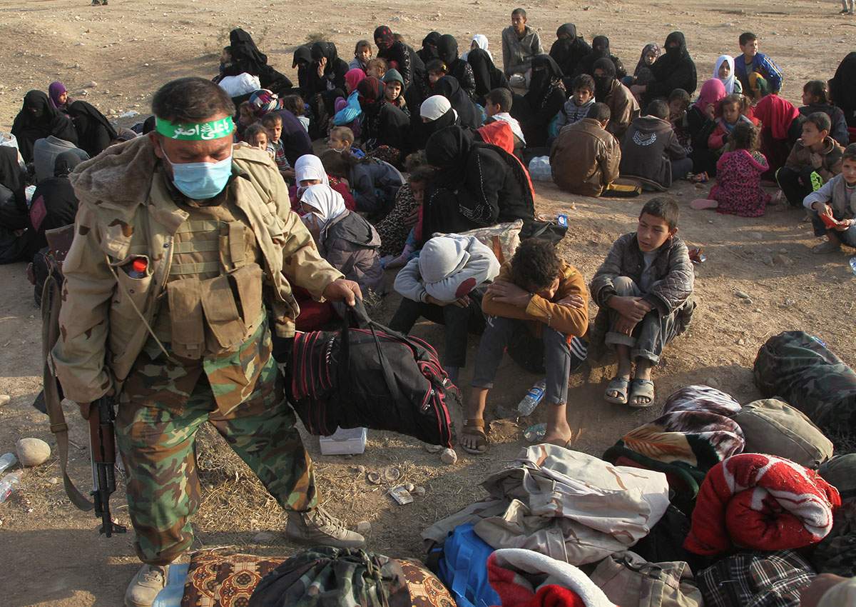 A view of displaced people who are fleeing from clashes in al-Shura, south of Mosul, during an operation to attack Islamic State militants south of Mosul, October 29, 2016.