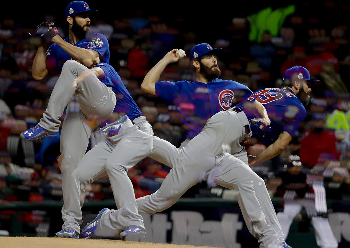 In this multiple exposure picture, Chicago Cubs starting pitcher Jake Arrieta throws against the Cleveland Indians during the fifth inning of Game 2 of the Major League Baseball World Series Wednesday, Oct. 26, 2016, in Cleveland. 