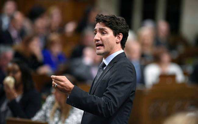 Prime Minister Justin Trudeau rises during Question Period on Monday, Oct. 17, 2016.
