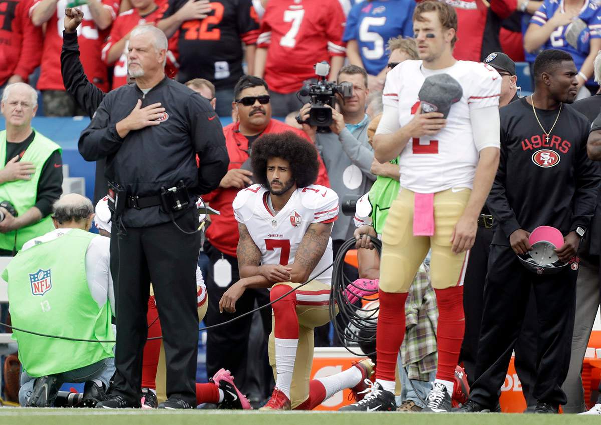 San Francisco 49ers quarterback Colin Kaepernick kneels during the national anthem before an NFL game against the Buffalo Bills on Oct. 16, 2016, in Orchard Park, N.Y.