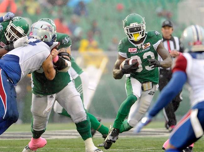 Saskatchewan Roughriders running back Joe McKnight (33) runs the ball during second half CFL action against the Montreal Alouettes, in Regina on Saturday, October 22, 2016. 