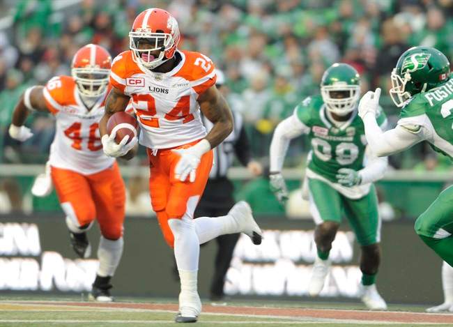 B.C. Lions running back Jeremiah Johnson (24) moves the ball up field against the Saskatchewan Roughriders during first half CFL action in Regina on Saturday, Oct. 29, 2016.