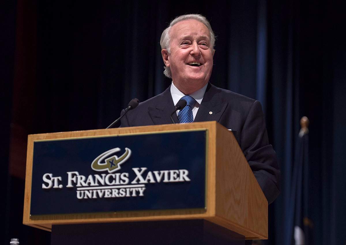 Former Prime Minister Brian Mulroney laughs while speaking following the announcement of the $60 million Brian Mulroney Institute of Government and Mulroney Hall at St. Francis Xavier University in Antigonish, N.S. on Wednesday, October 26, 2016. 
