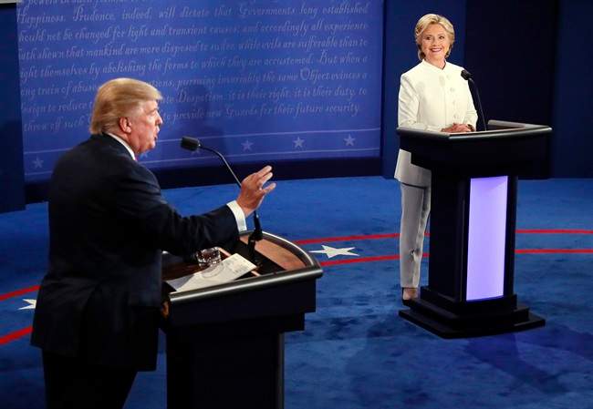 Republican presidential nominee Donald Trump debates Democratic presidential nominee Hillary Clinton.