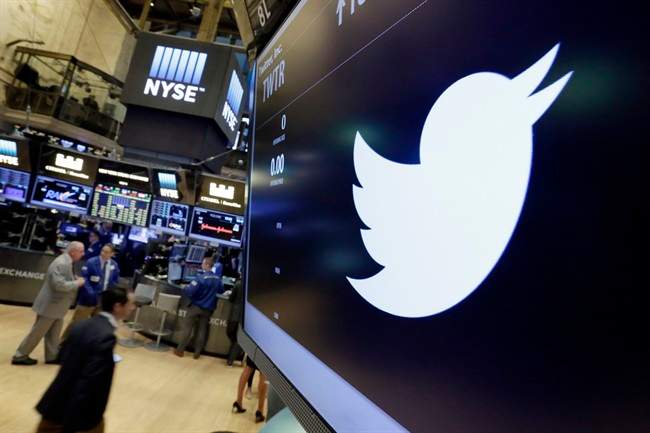 FILE - In this July 27, 2016, file photo, the Twitter symbol appears above a trading post on the floor of the New York Stock Exchange.  (AP Photo/Richard Drew, File).