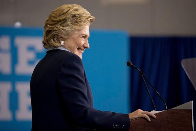 Democratic presidential candidate Hillary Clinton pauses as she speaks at a rally at the Downtown Toledo Train Station in Toledo, Ohio, Monday, Oct. 3, 2016. 