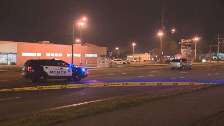 Police investigate after a pedestrian was hit at 50 Street and 97 Avenue in Edmonton on Oct. 24, 2016.
