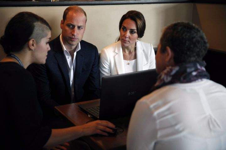 The Duke and Duchess of Cambridge meet with Kelty Mental Health Resources Centre members during a discussion and demonstration at the Breakwater Café in Victoria, B.C., Saturday, Oct. 1, 2016.