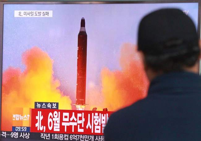 A man watches a TV news program showing a file image of a missile launch conducted by North Korea, at the Seoul Railway Station in Seoul, South Korea, Sunday, Oct. 16, 2016. South Korea and the U.S. said Sunday that the latest missile launch by North Korea ended in a failure after the projectile exploded soon after liftoff. The letters read "North attempted to fire a mid-range Musudan missile on June.