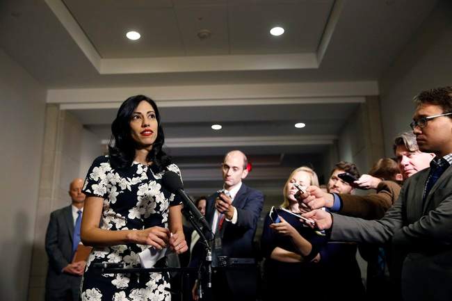  In this Oct., 16, 2015 file photo, Huma Abedin, a longtime aide to Hillary Rodham Clinton, speaks to the media after testifying at a closed-door hearing of the House Benghazi Committee, on Capitol Hill in Washington. The longtime Hillary Clinton aide at the center of a renewed FBI email investigation testified under oath four months ago she never deleted old emails, despite promising in 2013 not to take sensitive files when she left the State Department.