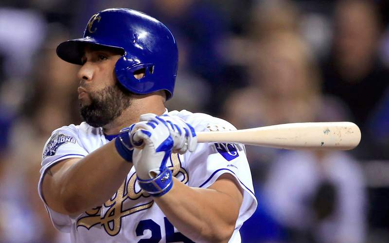 Kansas City Royals designated hitter Kendrys Morales watches his RBI single during the sixth inning of a baseball game against the Chicago White Sox at Kauffman Stadium in Kansas City, Mo., Friday, Sept. 16, 2016. 