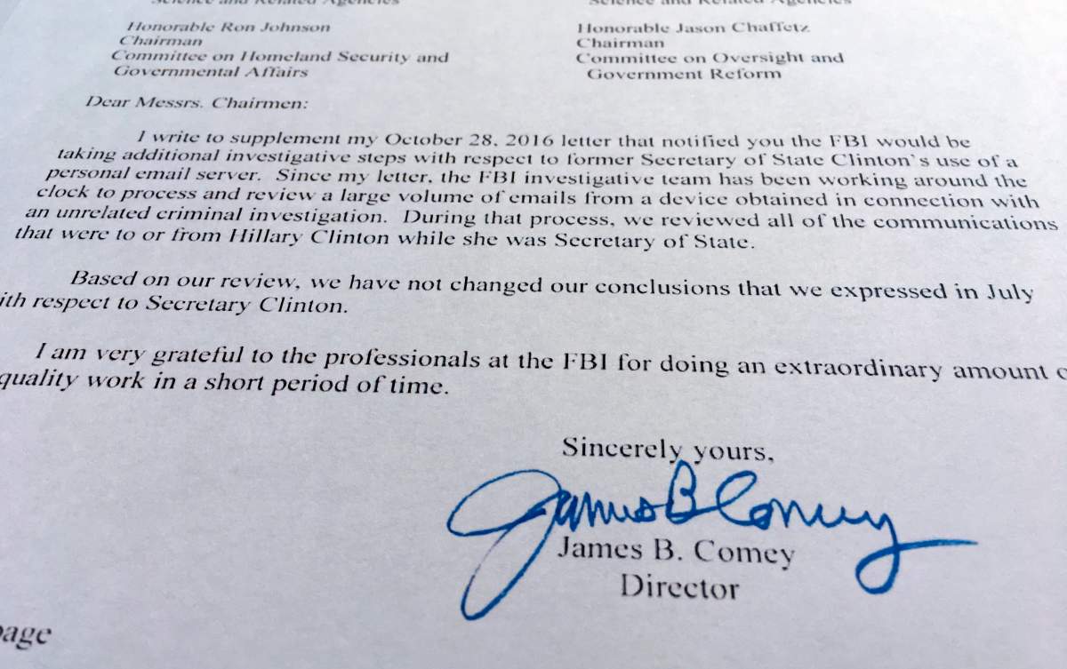 Part of a Nov. 6, 2016, letter from FBI director James Comey to Congress is photographed in Washington, Sunday, Nov. 6, 2016.