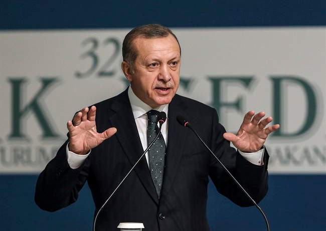 Turkey's President Recep Tayyip Erdogan addresses an annual economy and trade meeting of the Organization for Islamic Cooperation in Istanbul, Wednesday, Nov. 23, 2016.