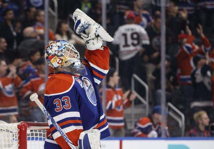 Edmonton Oilers goalie Cam Talbot (33) celebrates the shutout against the Chicago Blackhawks during NHL action in Edmonton, Alta., on Monday November 21, 2016. 