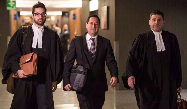 his lawyers, arrives at the courthouse, in Montreal in a November 14, 2016, file photo. 