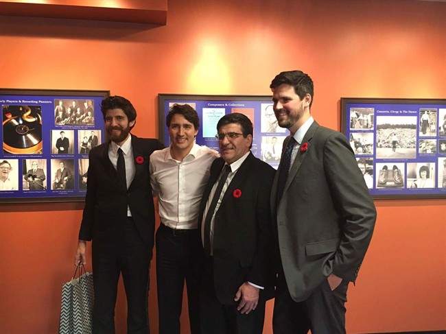 Prime Minister Justin Trudeau poses for a photo with members of the Hadhad family, including Tareq (left)  in an undated handout photo. 