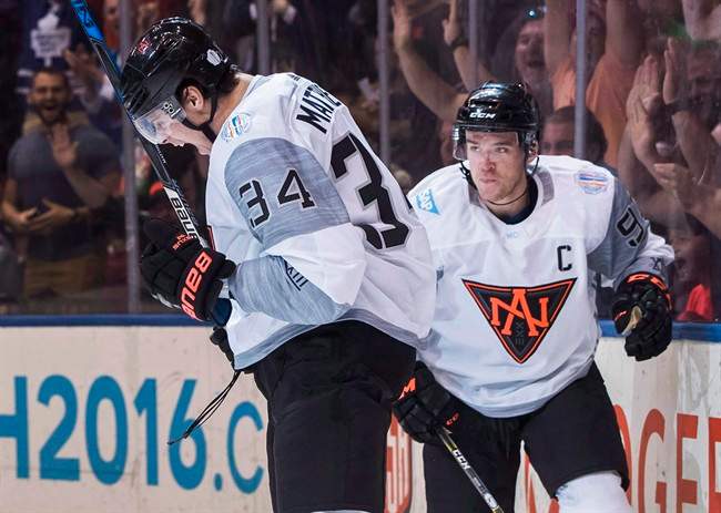 Team North America's Auston Matthews celebrates his goal with teammate Connor McDavid, right, against Sweden during first period World Cup of Hockey action in Toronto, Wednesday September 21, 2016. The NHL's last two No. 1 overall picks will meet for the first time tonight as Matthews' Toronto Maple Leafs host McDavid's Edmonton Oilers.