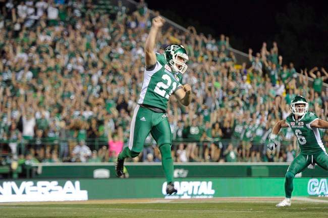 Saskatchewan Roughriders kicker Tyler Crapigna celebrates after kicking the game-winning field goal against the Ottawa Redblacks during CFL action in Regina on Friday, July 22, 2016. Kickers Sean Whyte and Crapigna, receiver Andy Fantuz and linebacker Bear Woods were all double nominees in the opening-round of voting for the CFL's outstanding player awards.
