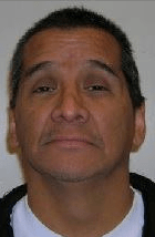 The suspect, 55-year-old Daryl Silas Hunt, was treated for a dog bite and taken into custody. Hunt has been charged with break-and-enter and remains in custody.
