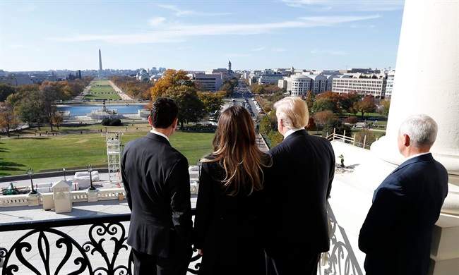 House Speaker Paul Ryan, left, shows President-elect Donald Trump, his wife Melania and Vice president-elect Mike Pence the view from the Speaker's Balcony on Capitol Hill in Washington, Thursday, Nov. 10, 2016.