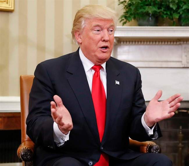 Donald Trump, seen here in the White House, may tweak his tone when confronted with the challenges of governing, Prime Minister Trudeau said Friday.