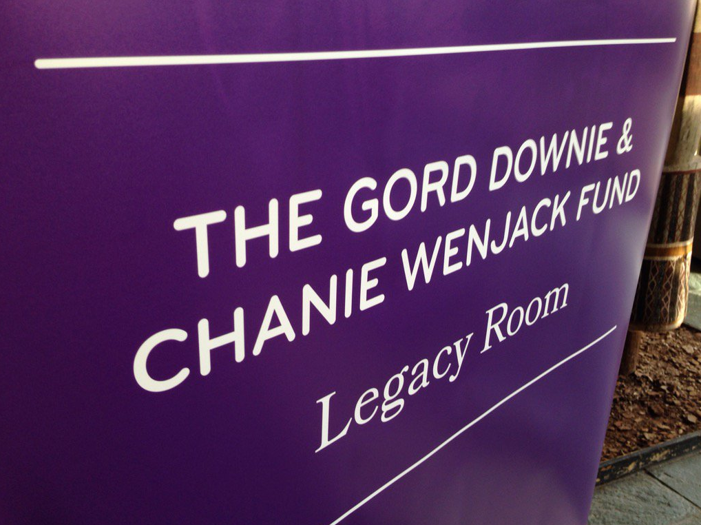 A banner for the Legacy Room initiative is pictured.